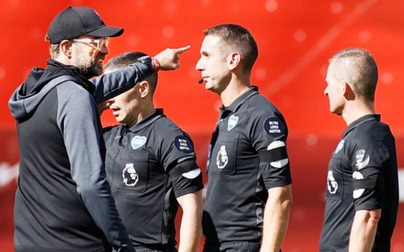 Referee David Coote punished for insulting Jurgen Klopp