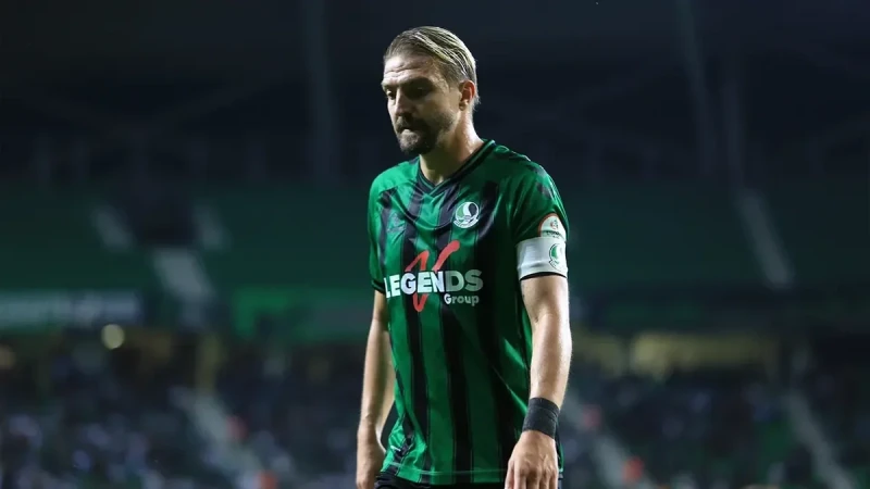 Caner Erkin receives his fourth red card of the current season