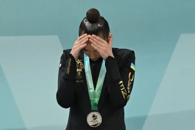 Ukraynalı gimnastın Rusiya himninə reaksiyası müzakirəyə səbəb oldu